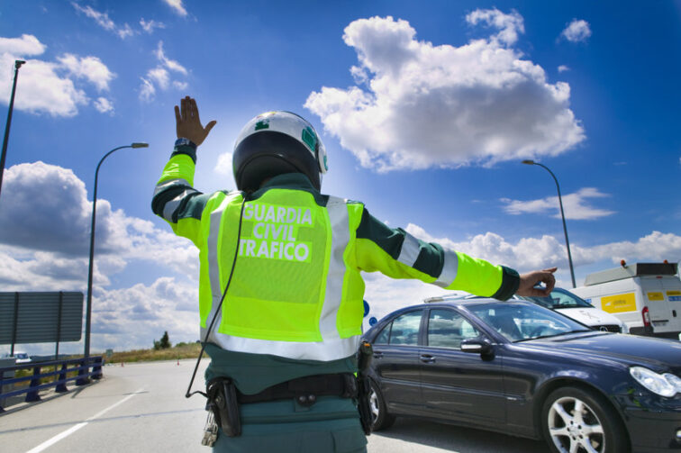 Guardia Civil, Spanish Road Traffic Police, Stopping A Car On The Roadside.